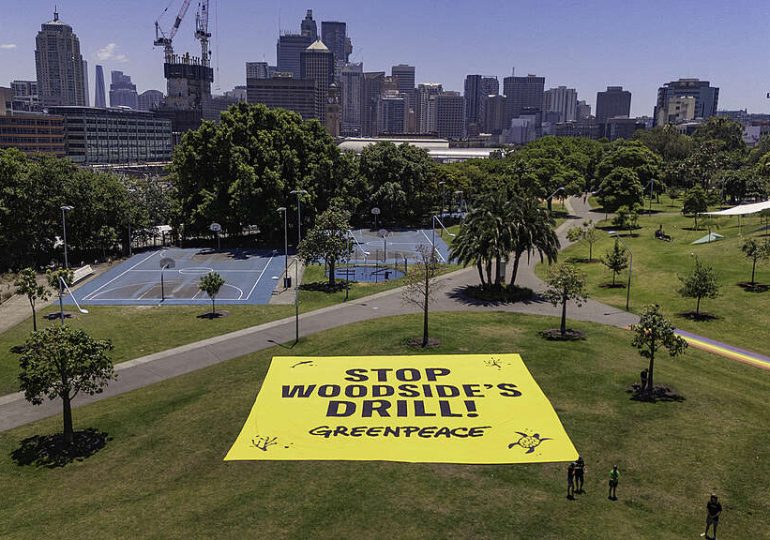 Banner drop near Minister Plibersek’s office calls on gov to stop Woodside’s Burrup Hub following WA approval