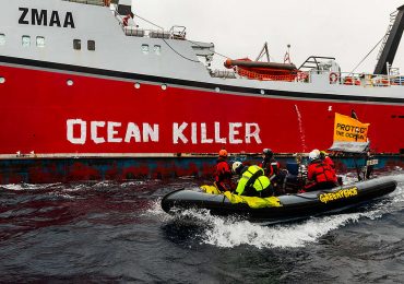Greenpeace activists rebrand NZ bottom trawler “ocean killer” at sea
